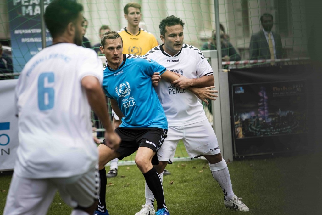 07 - 2015 Football for Peace match, Peter Lovenkrands and Obaidullah Karimi_LOW